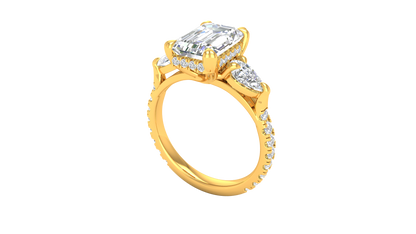 3 Carat Emerald Cut Engagement Ring With Pear Side Stones In 14K Yellow Gold